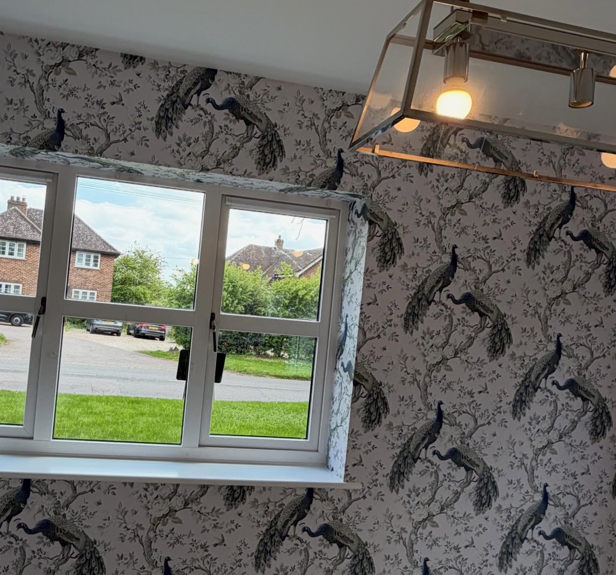 Decorated bedroom with wallpaper